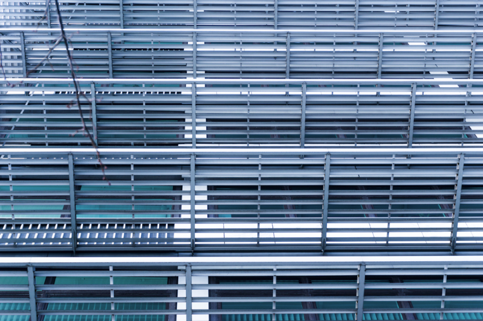 Window louvers on the building balance airflow, light, and privacy with sleek design.